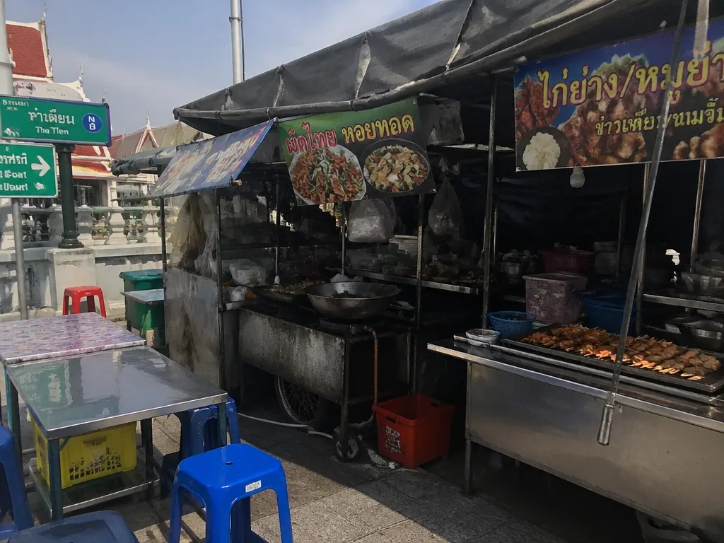 Tha Tien market street food stalls near pier exit