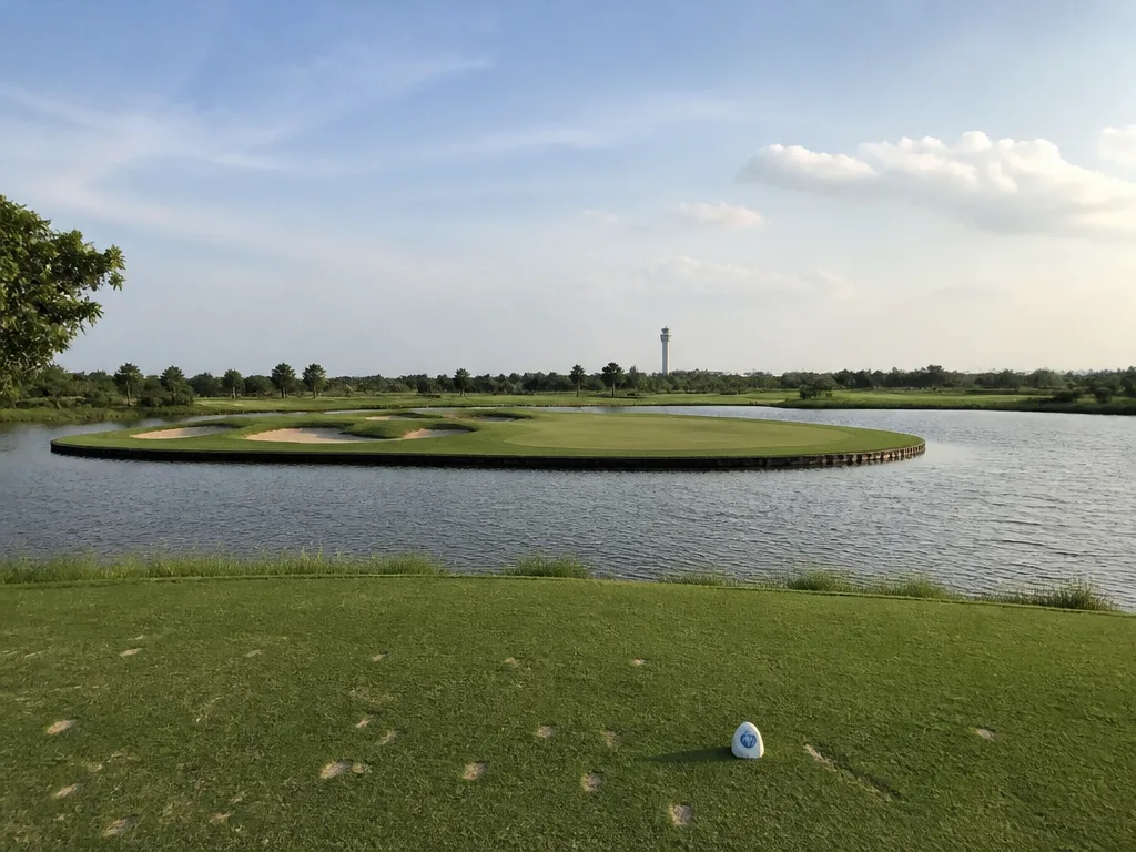 Greg Norman style links course with island green and water hazard
