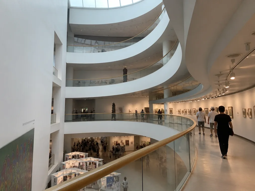 Bangkok Art and Culture Centre spiral atrium during rainy day