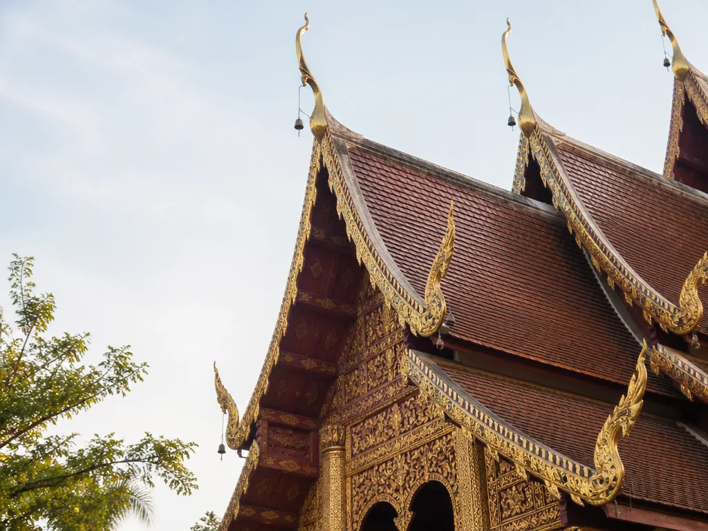 Wat Phra Singh Lanna multi-tier roof carved gable Chiang Mai