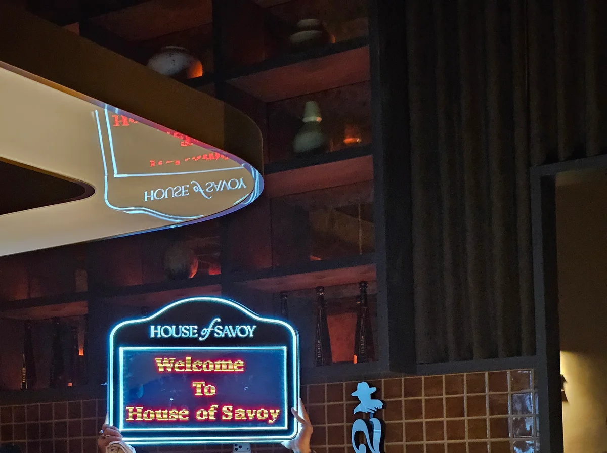 House of Savoy neon welcome sign on opening night Bangkok