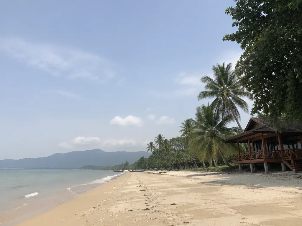 Empty Maenam beach with palm trees and bungalow