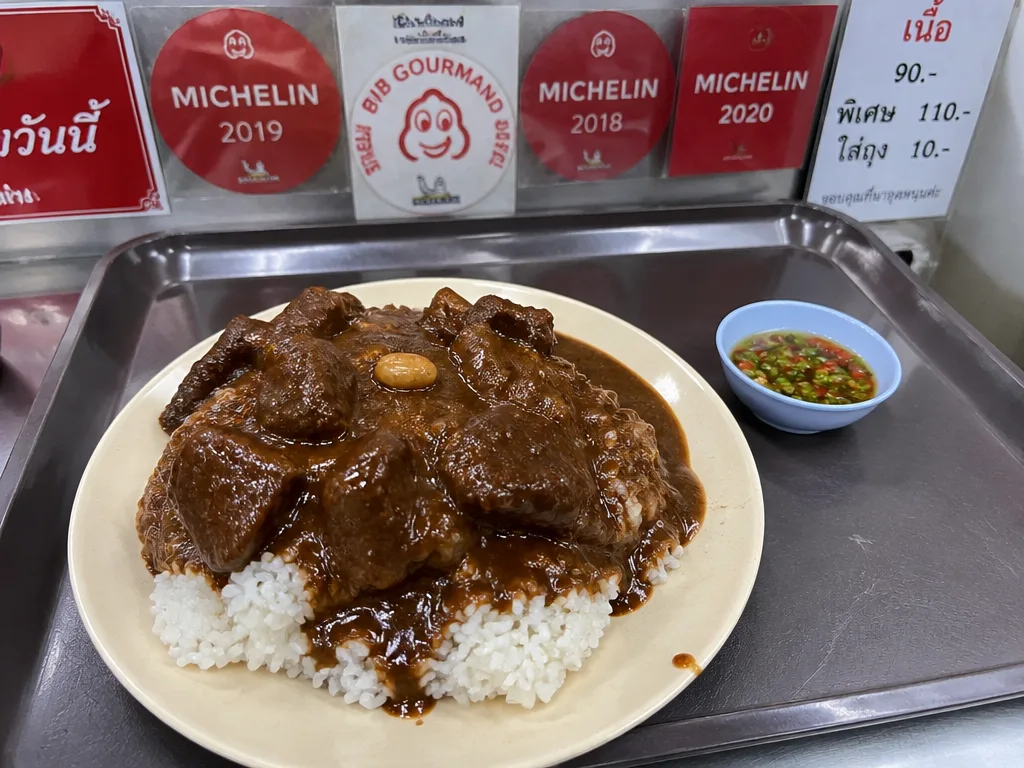 Southern Thai curry rice plate with massaman over jasmine rice