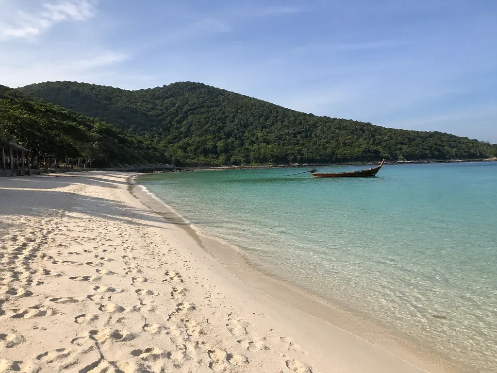 Tawaen Beach Koh Larn turquoise water early morning