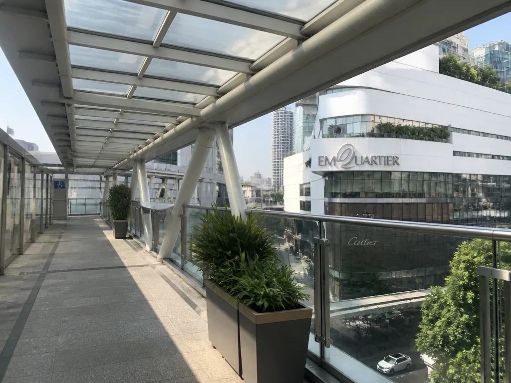 EmQuartier skywalk from Phrom Phong BTS station with covered walkway